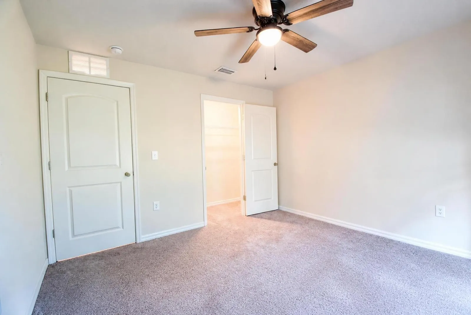 First-story bedroom at 205 River Hill Drive