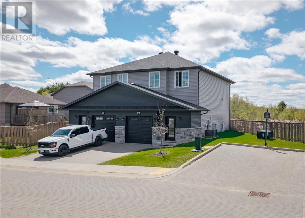 Townhome exterior and adjoining units at 2279 Mallards Landing Drive #19