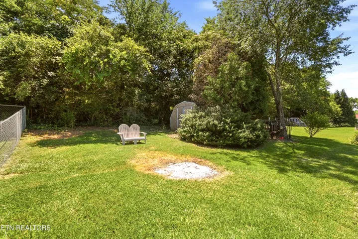 Wide view of the fenced lawn