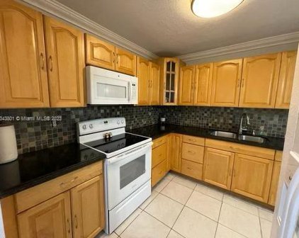 6930 Miami Gardens Dr Unit #1-406, Hialeah