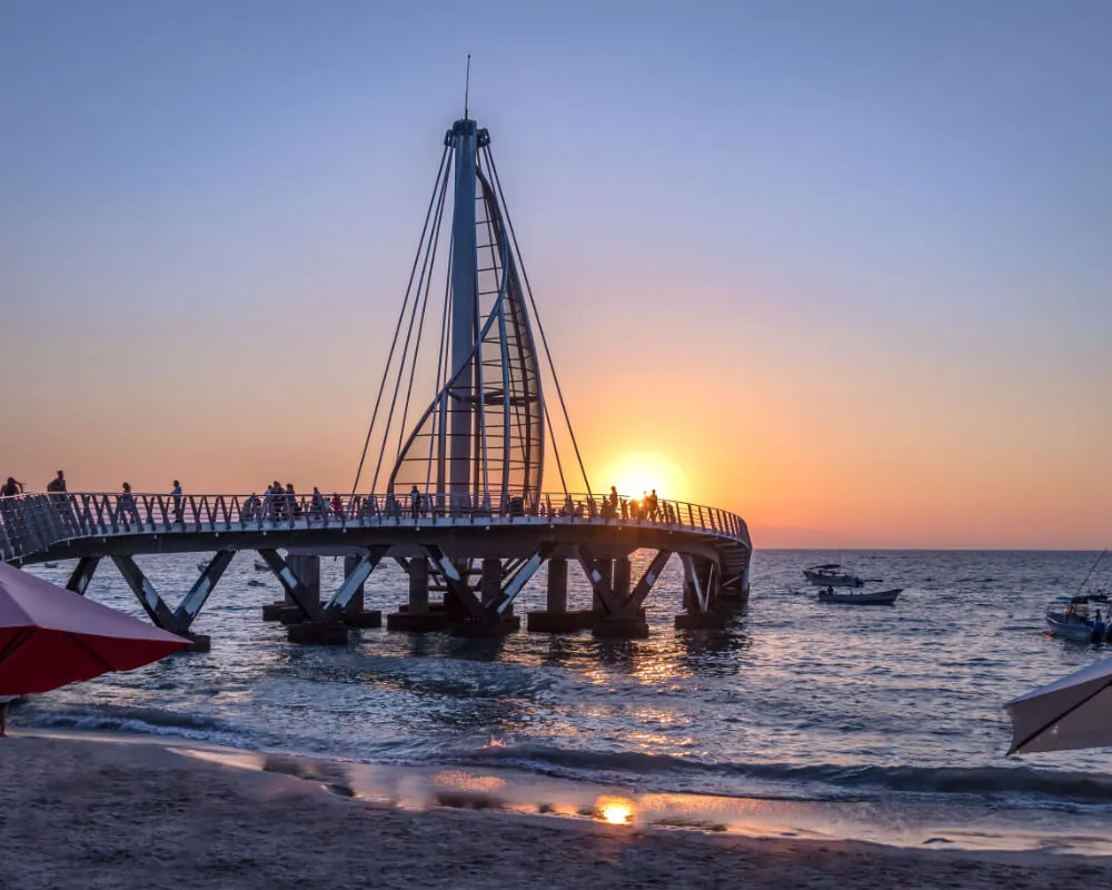 Los Muertos pier and the Zona Rom&aacute;ntica coastline