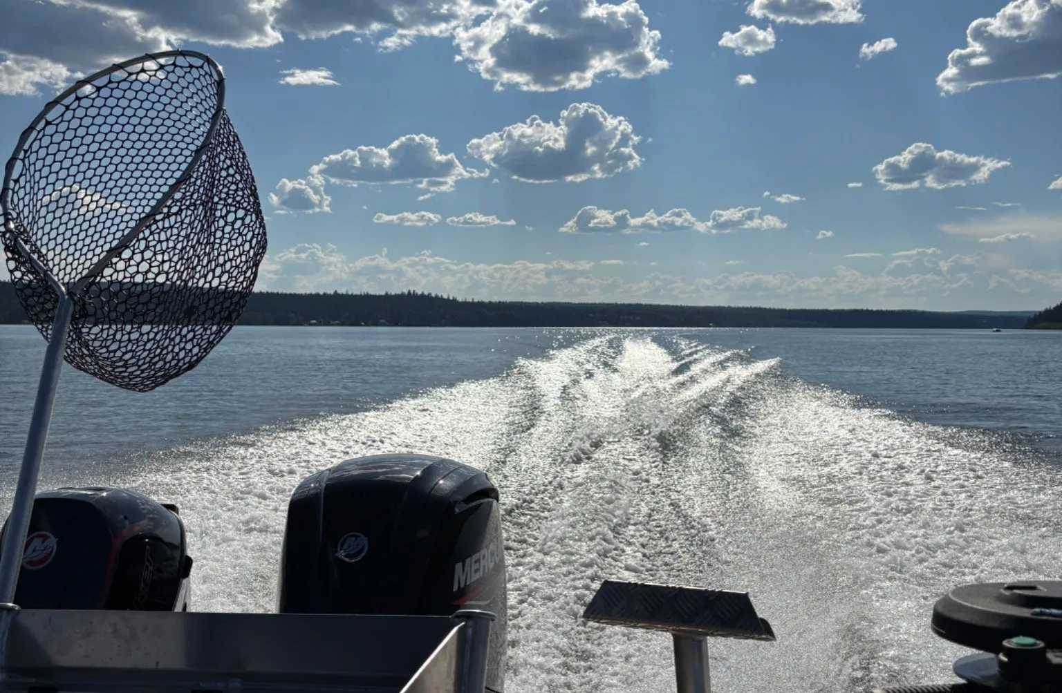 Fishing net and boat wake on Horse Lake