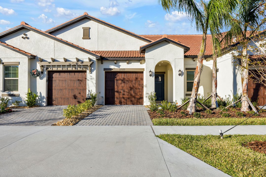 17253 Holly Well Avenue, pond view villa in Medley at Southshore Bay, Wimauma, Florida 33598