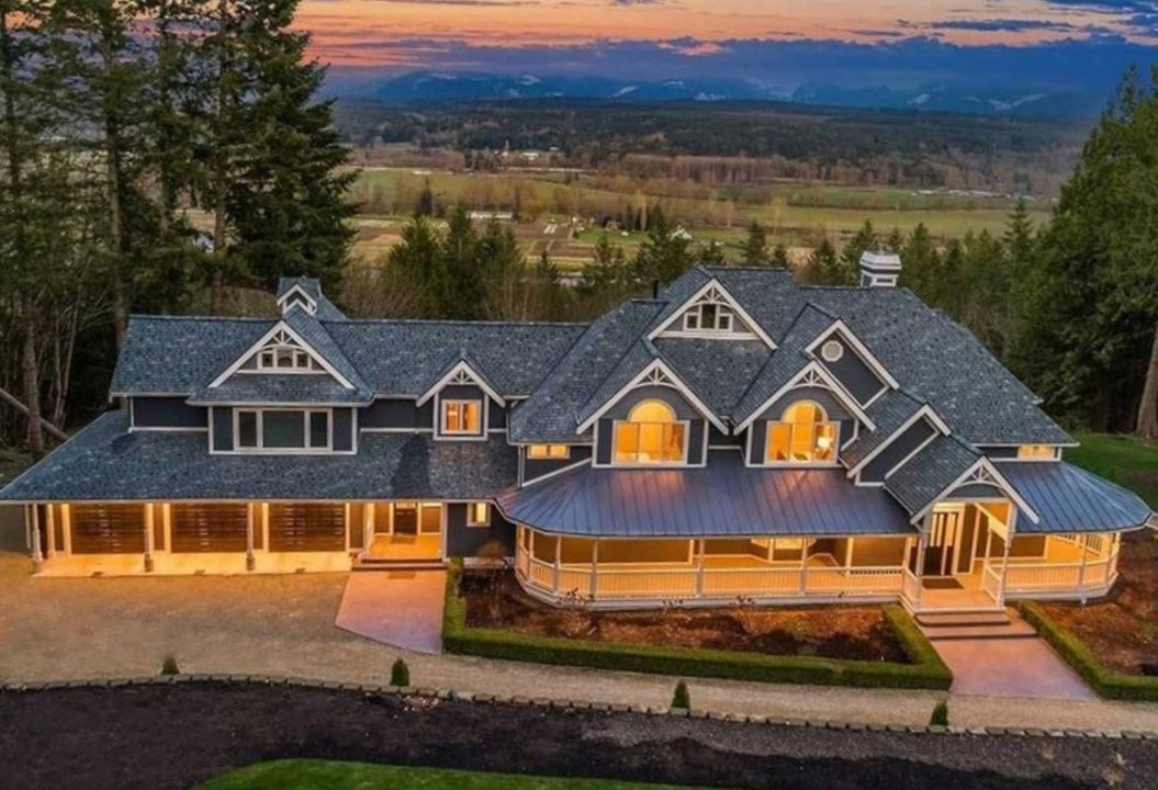 Estate home at dusk, Eastside luxury listing