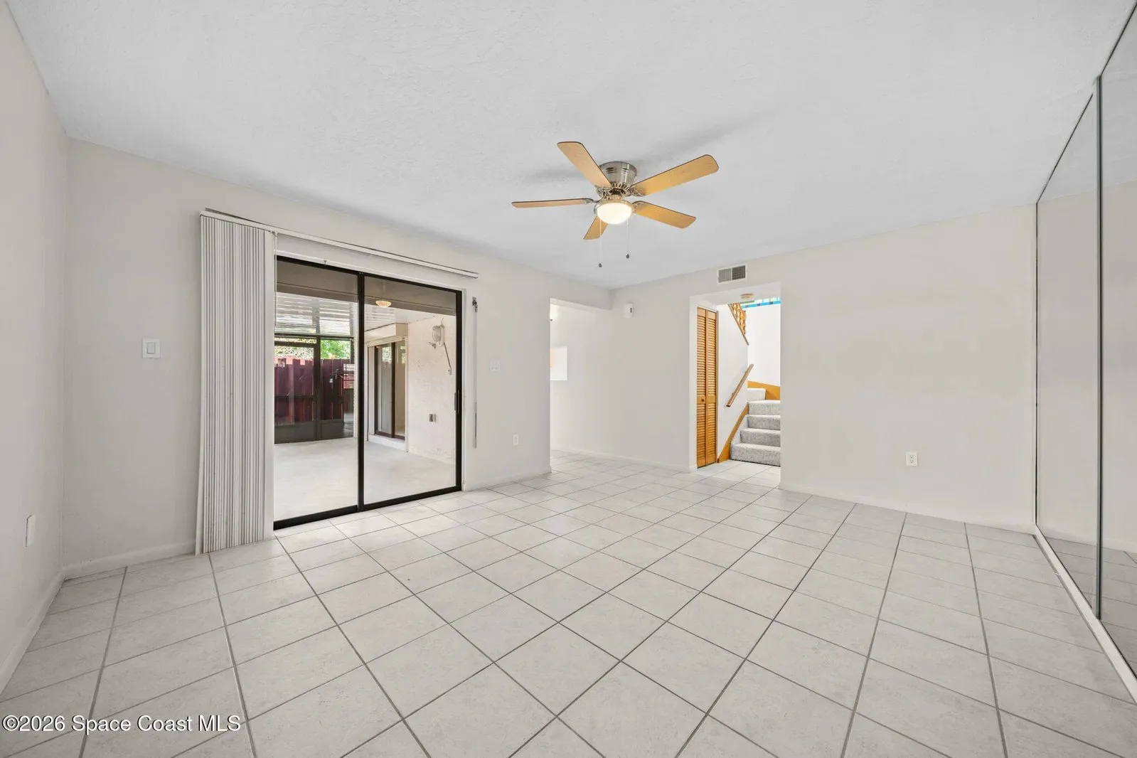 Living room with sliding doors at 44 Piney Branch Way