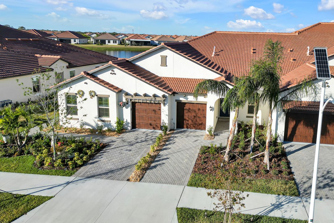 17253 Holly Well Avenue, pond view villa in Medley at Southshore Bay, Wimauma, Florida 33598